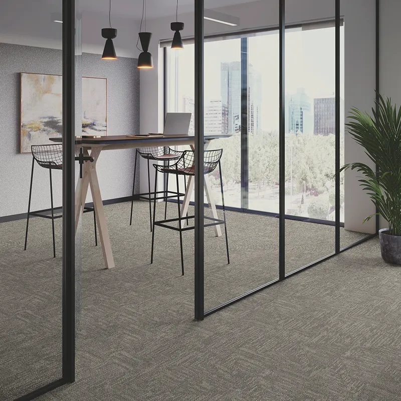 Carpet in office with glass wall and stand-up desk | Sterling Carpet Shops
